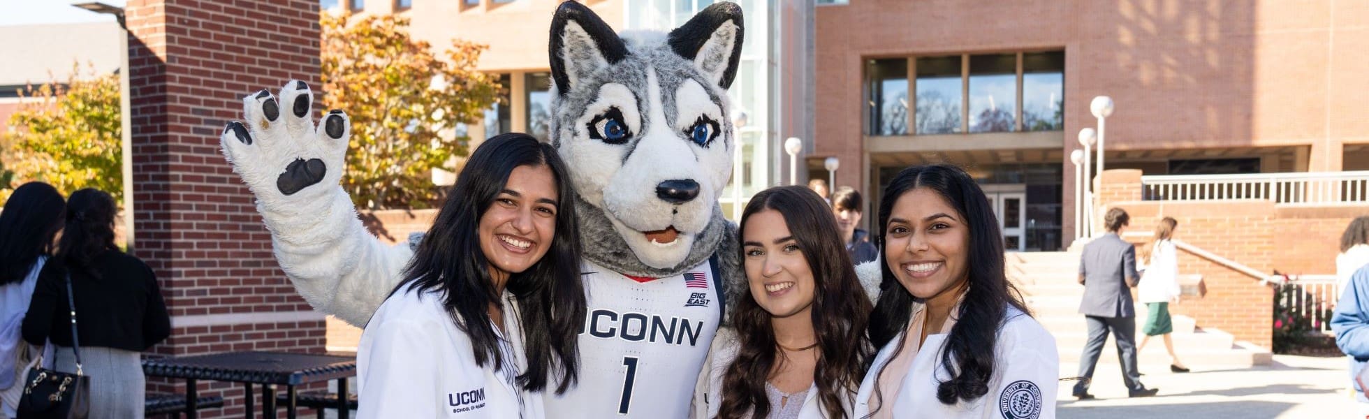 Jonathan the Husky and Pharmacy Students